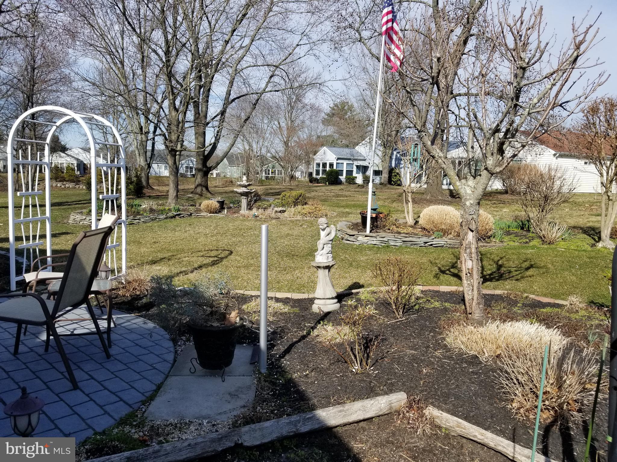 26 Dunstable Road Southampton, NJ 08088 - Photo 30 of 31 a view of a house with backyard and sitting area