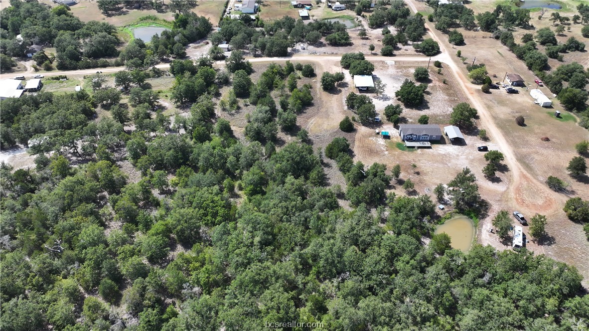 0 Sue Lane Somerville, TX 77879 - Photo 7 of 10 an aerial view of residential houses with outdoor space