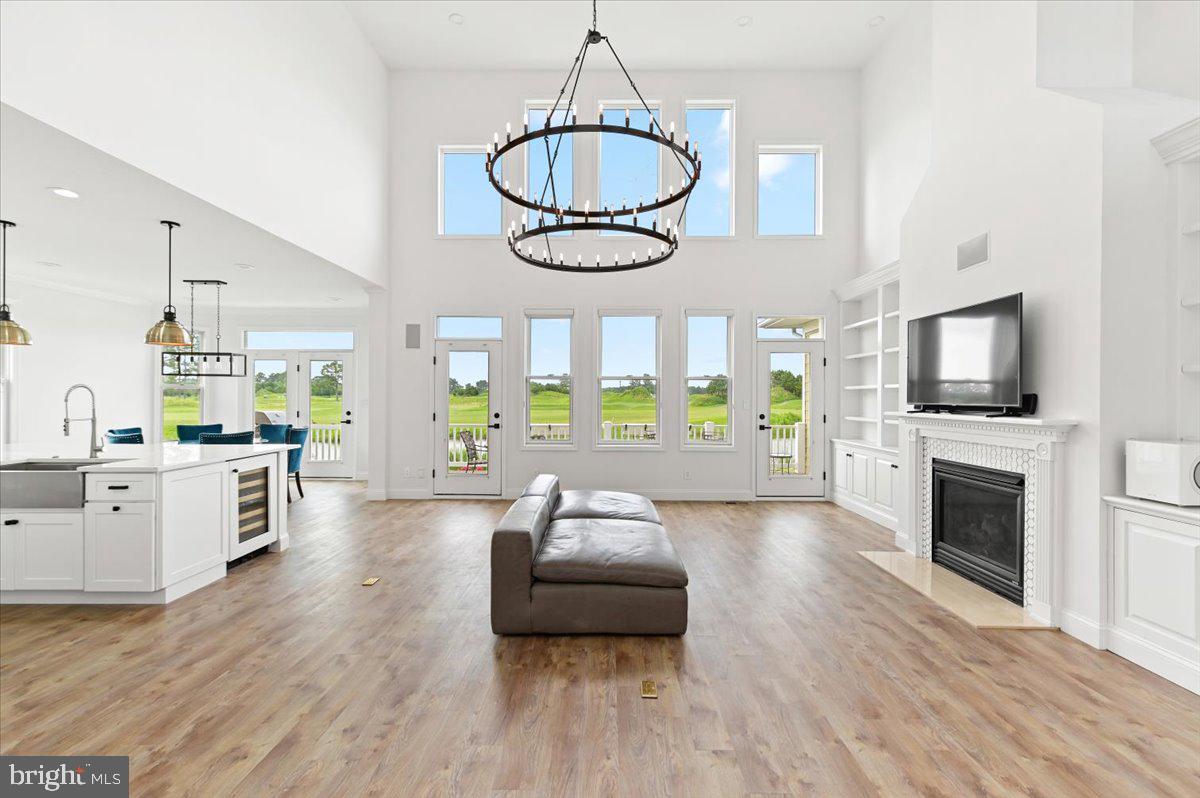 10204 Ruffian Lane Berlin, MD 21811 - Photo 2 of 70 Family room with stunning chandelier