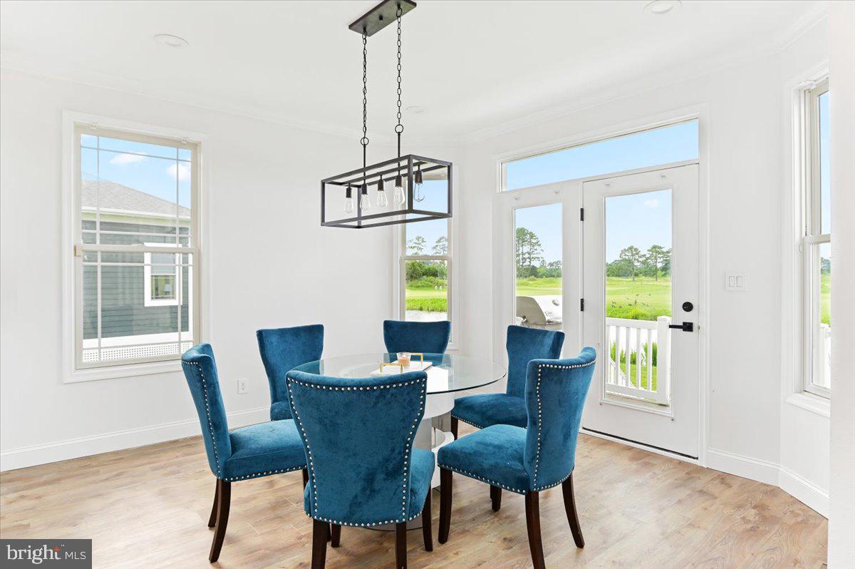 10204 Ruffian Lane Berlin, MD 21811 - Photo 17 of 70 Dining area with custom lighting