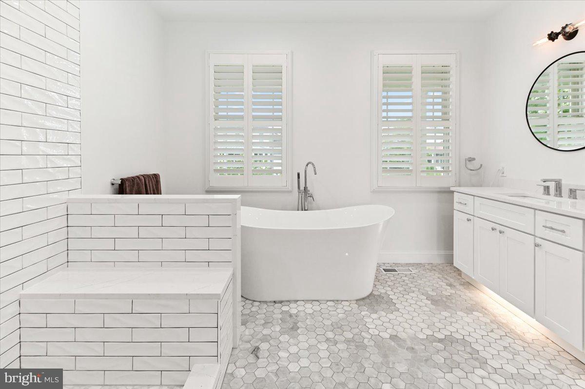 10204 Ruffian Lane Berlin, MD 21811 - Photo 25 of 70 Primary bathroom with custom tile work