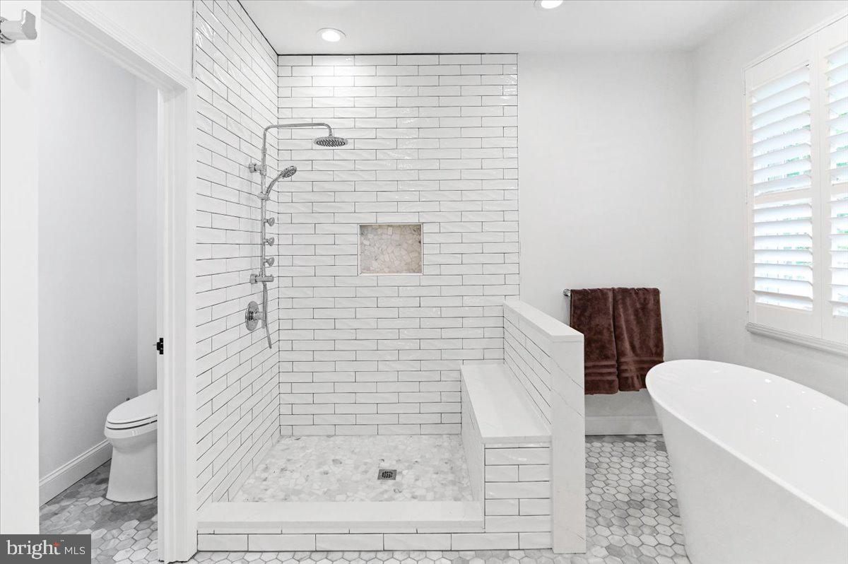10204 Ruffian Lane Berlin, MD 21811 - Photo 26 of 70 Primary bathroom with custom tile work