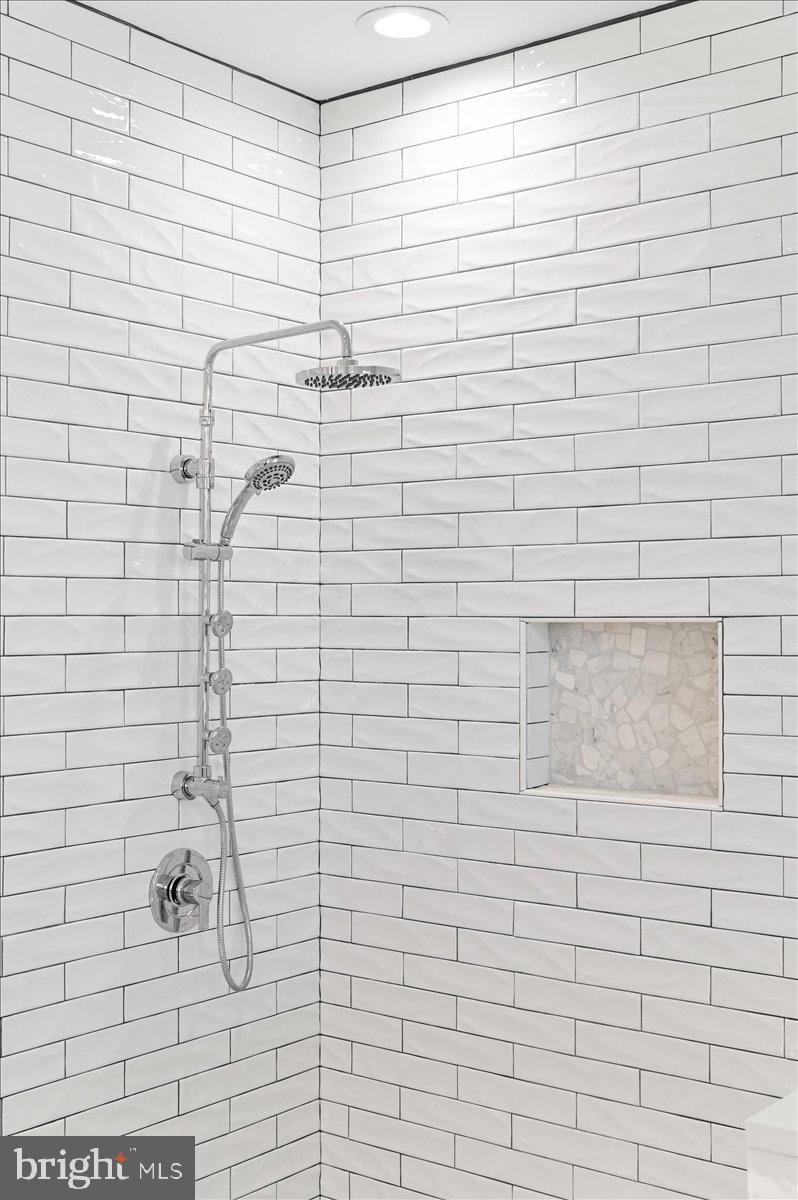 10204 Ruffian Lane Berlin, MD 21811 - Photo 31 of 70 Primary bathroom custom tiled shower