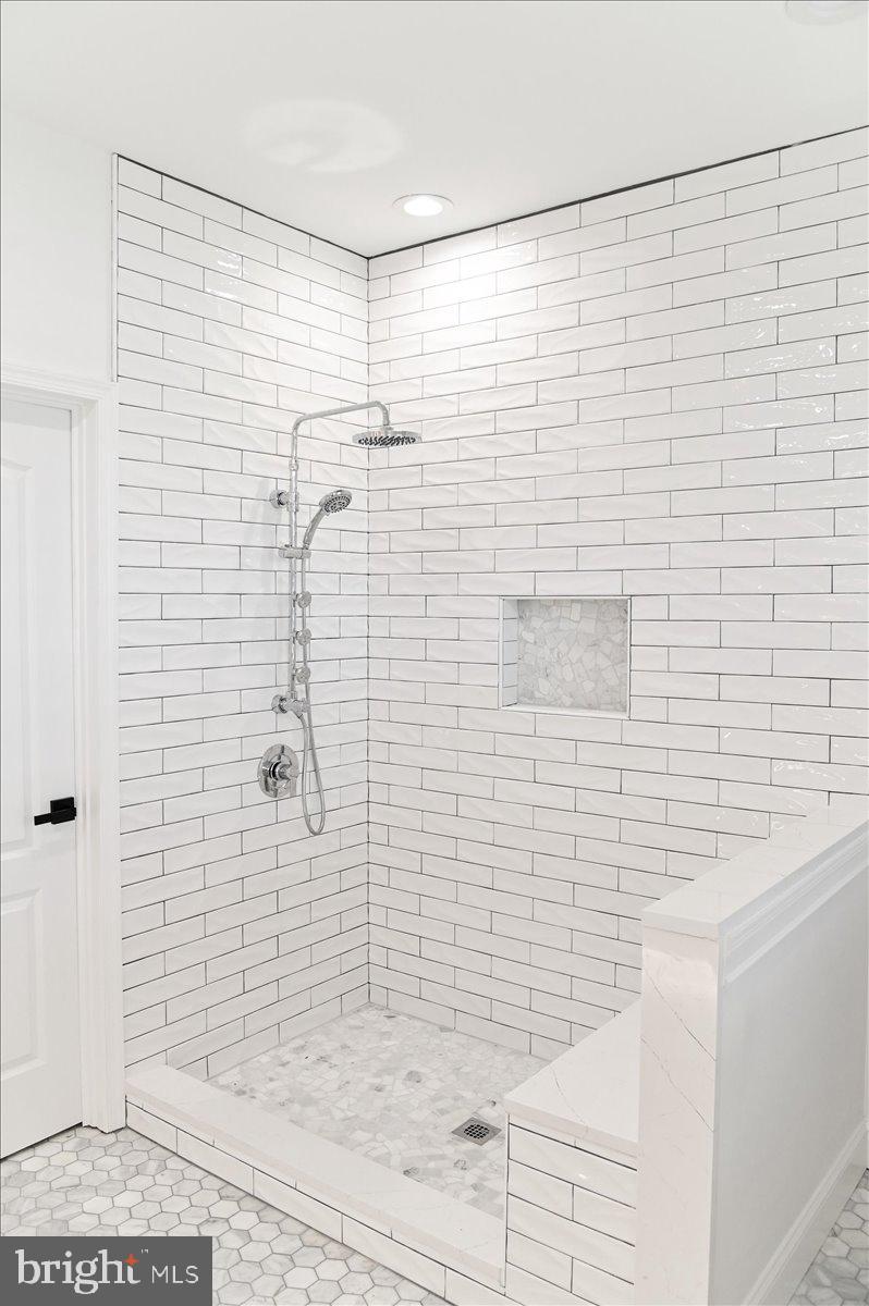 10204 Ruffian Lane Berlin, MD 21811 - Photo 32 of 70 Primary bathroom custom tiled shower