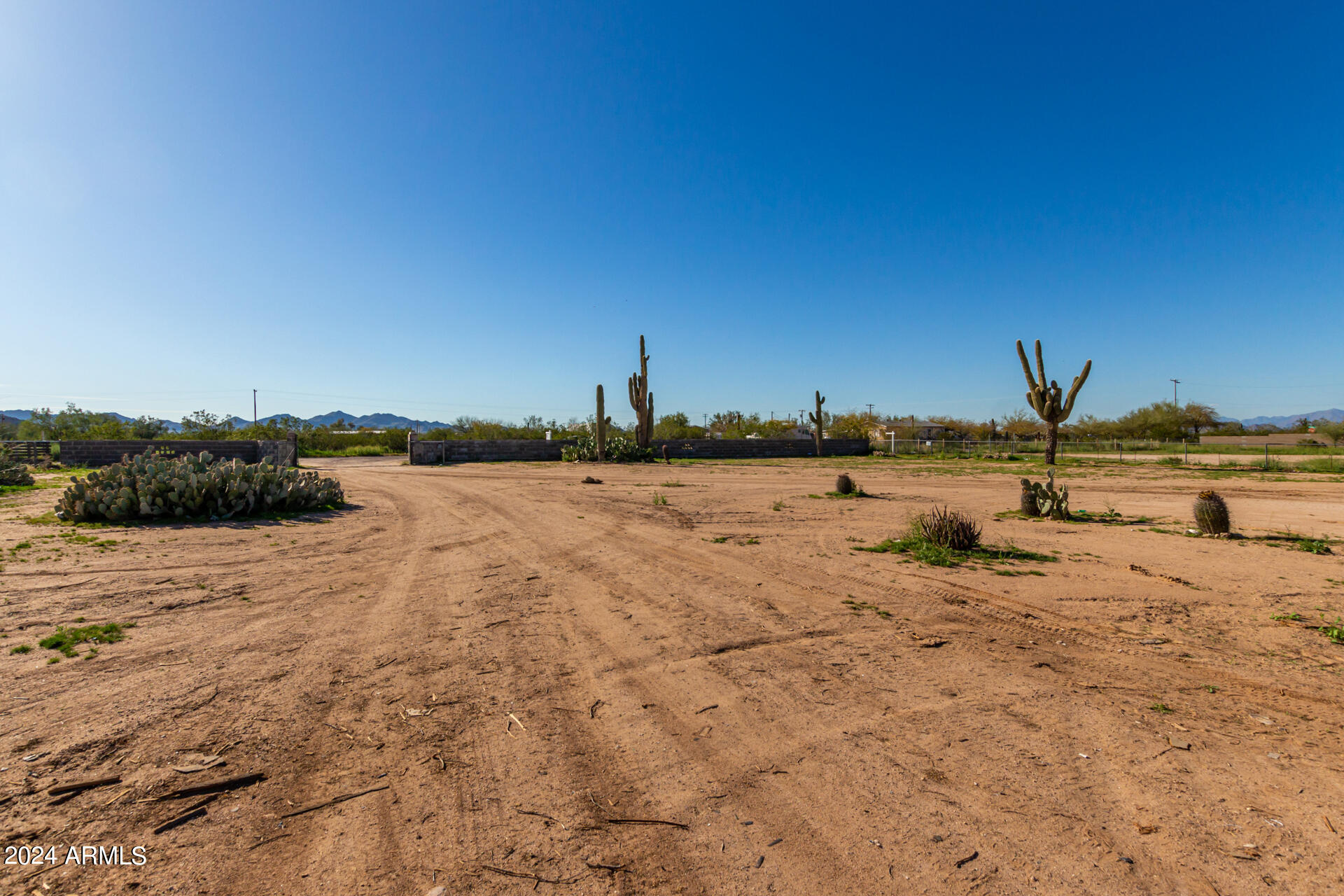 355 North Conejo Road Maricopa, AZ 85139 - Photo 30 of 30 a view of a lake with beach