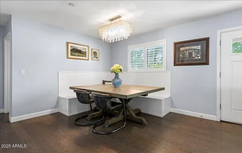 a view of a workspace with furniture