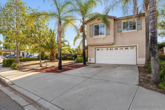 a view of a building with a street