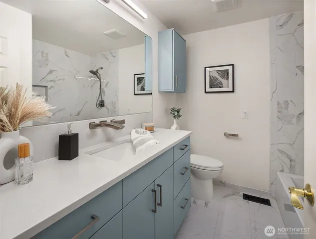 a bathroom with a sink and a toilet