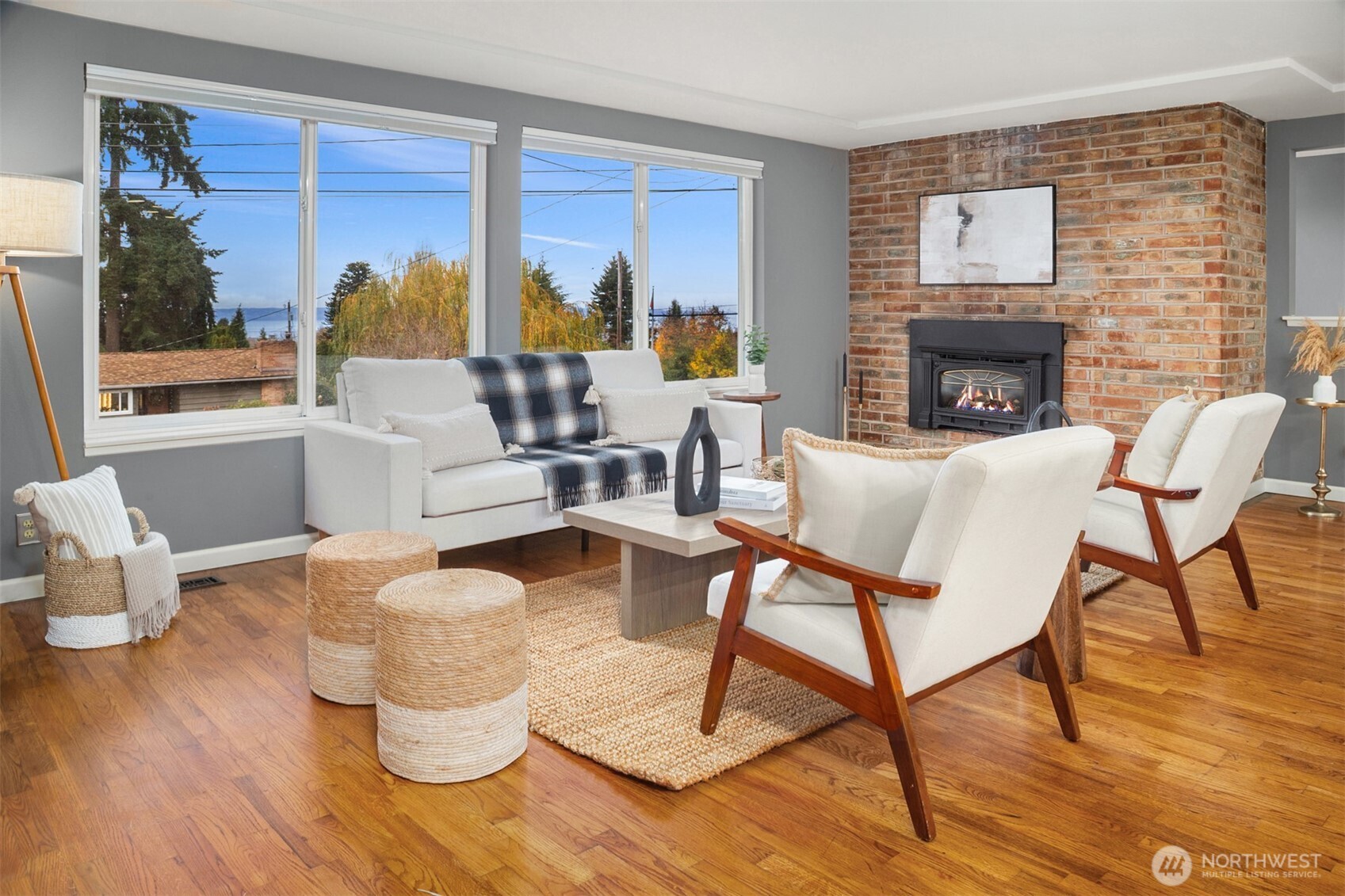 1221 Coronado Place Edmonds, WA 98020 - Photo 16 of 32 a living room with furniture and a fireplace