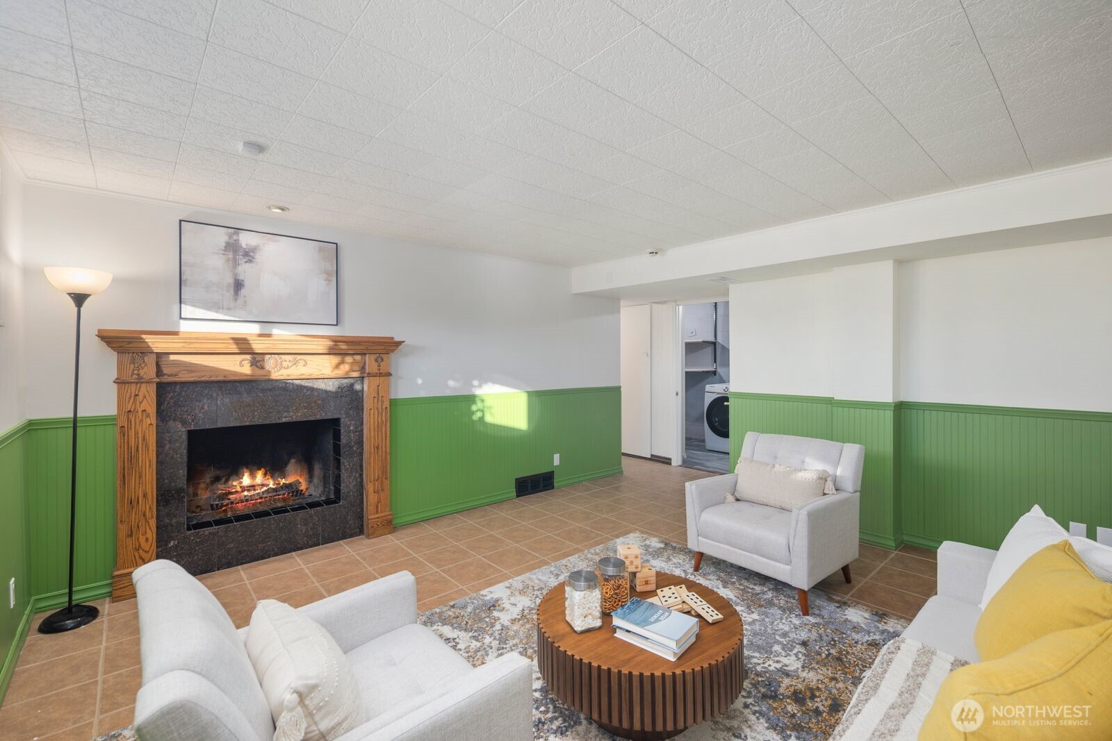 1221 Coronado Place Edmonds, WA 98020 - Photo 23 of 32 a living room with furniture and a fireplace