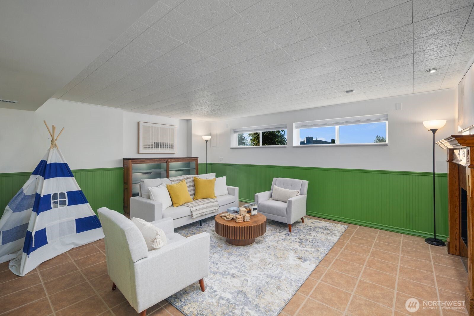 1221 Coronado Place Edmonds, WA 98020 - Photo 24 of 32 a living room with furniture and a garden