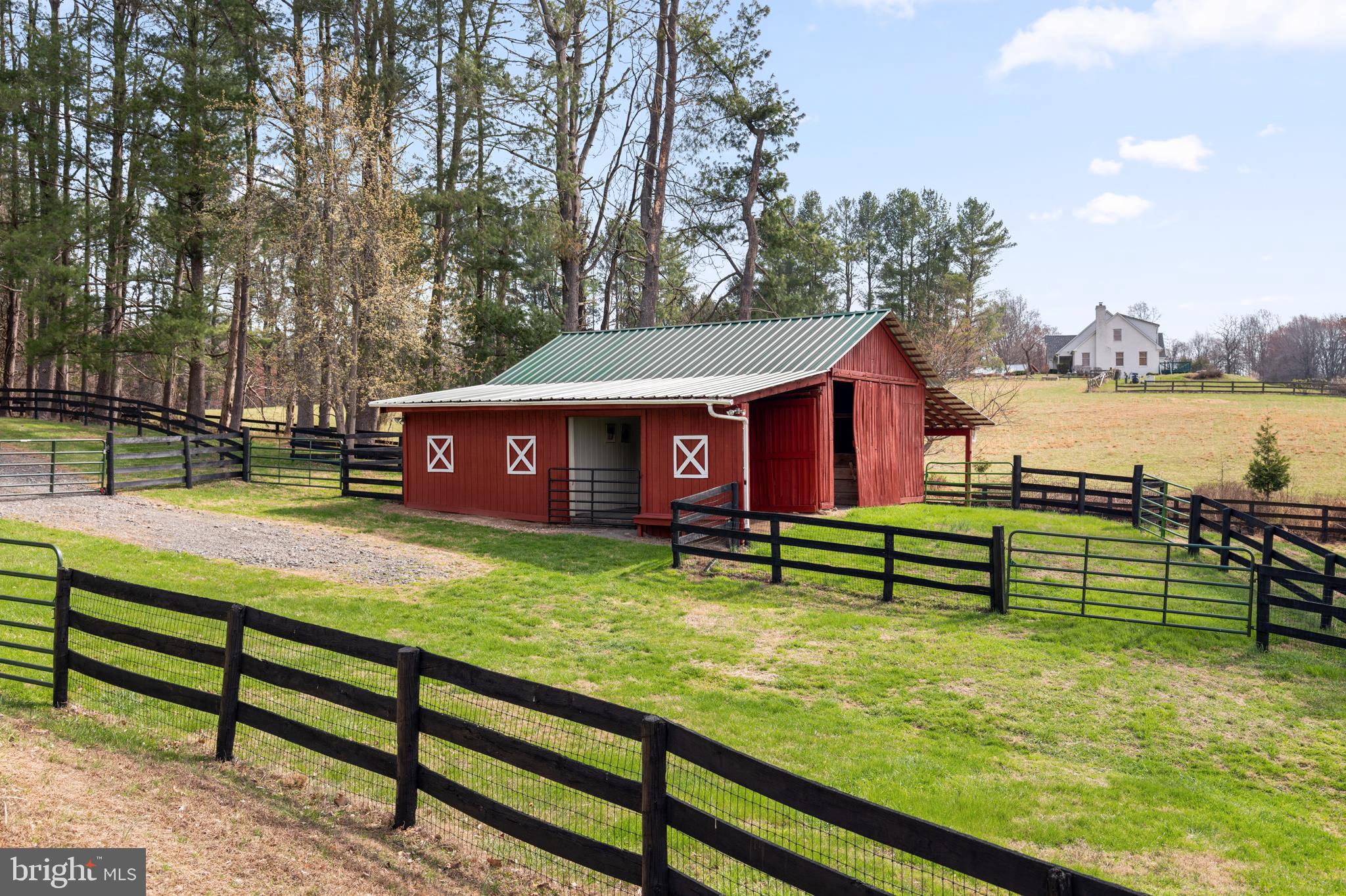 10803 Crest Hill Road Marshall, VA 20115 - Photo 21 of 30 Charming red barn in serene countryside.