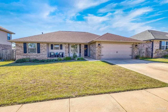 a view of a house with a swimming pool