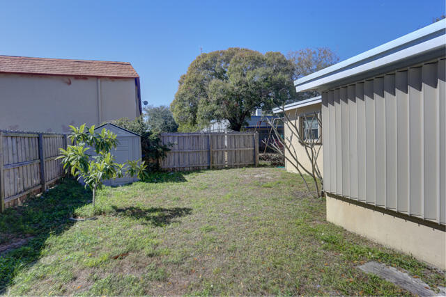 910 9th Street Lake Park, FL 33403 - Photo 15 of 34 Backyard 910 9th St Lake Park