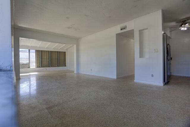910 9th Street Lake Park, FL 33403 - Photo 20 of 34 Living room to kitchen view 910 9th St