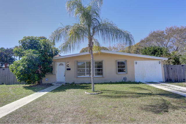 910 9th Street Lake Park, FL 33403 - Photo 2 of 34 Front 910 9th St Lake Park