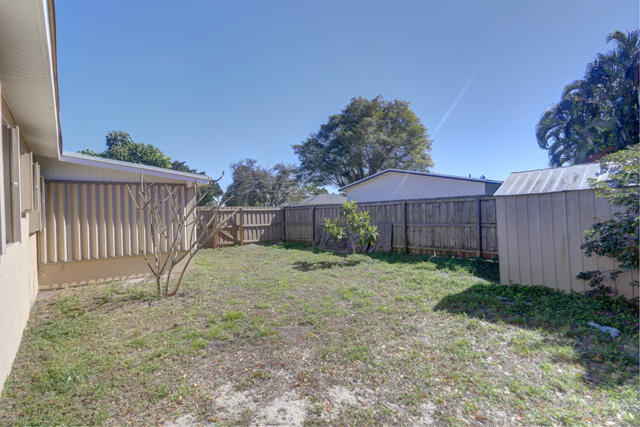 910 9th Street Lake Park, FL 33403 - Photo 23 of 34 Accordion shutters 910 9th St