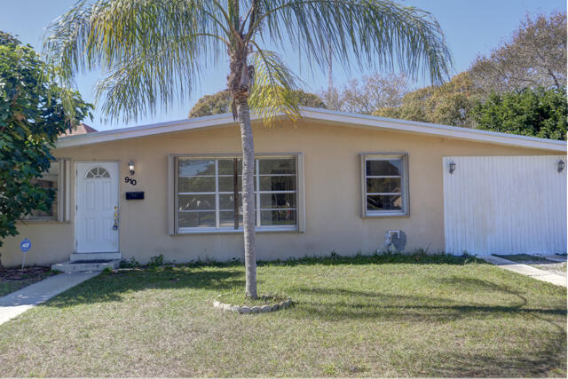910 9th Street Lake Park, FL 33403 - Photo 32 of 34 Front close up 910 9th St Lake Park