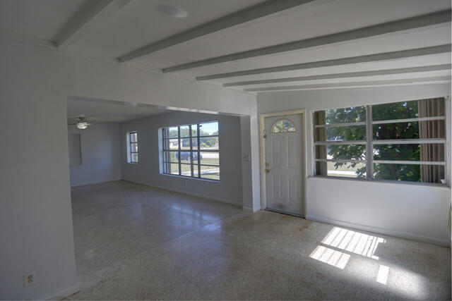 910 9th Street Lake Park, FL 33403 - Photo 5 of 34 Front sunroom 910 9th St Lake Park