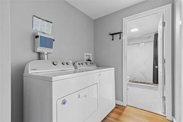 a utility room with dryer and washer