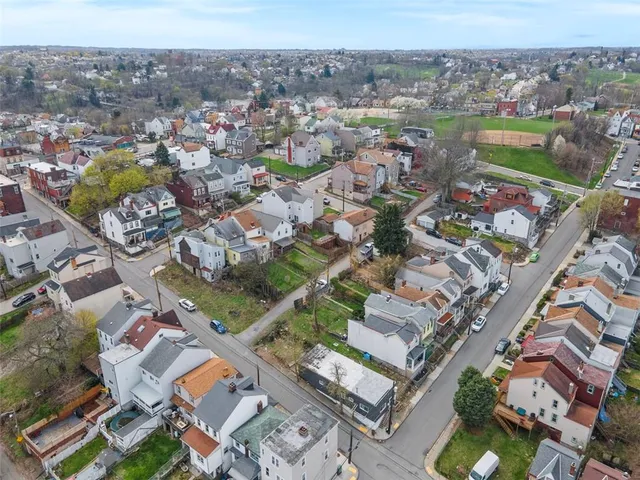 an aerial view of a city with lots of residential buildings