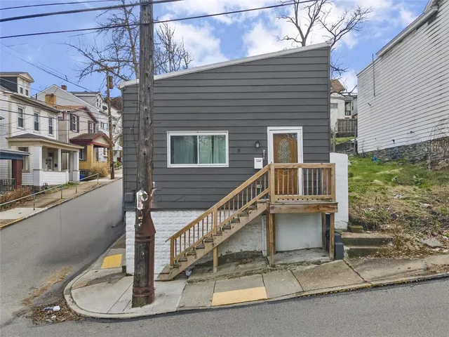 a house view with a garden space