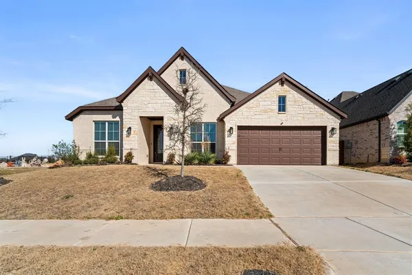 front view of a house and a yard