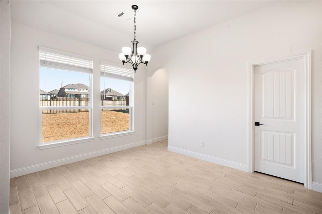 3841 Eagles Bluff Road Midlothian, TX 76065 - Photo 15 of 36 a view of an empty room with a window