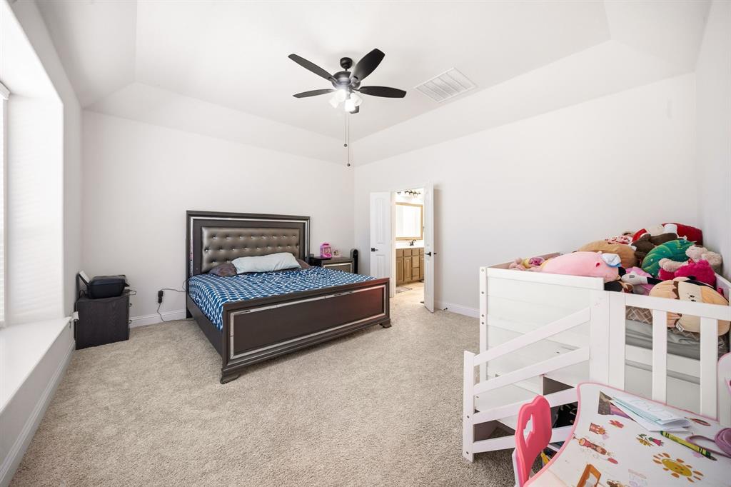 3841 Eagles Bluff Road Midlothian, TX 76065 - Photo 17 of 36 a bedroom with furniture and a bed