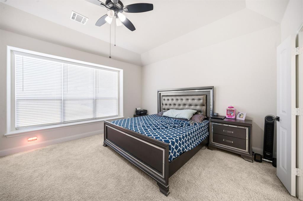 3841 Eagles Bluff Road Midlothian, TX 76065 - Photo 18 of 36 a bed room with a bed and a window