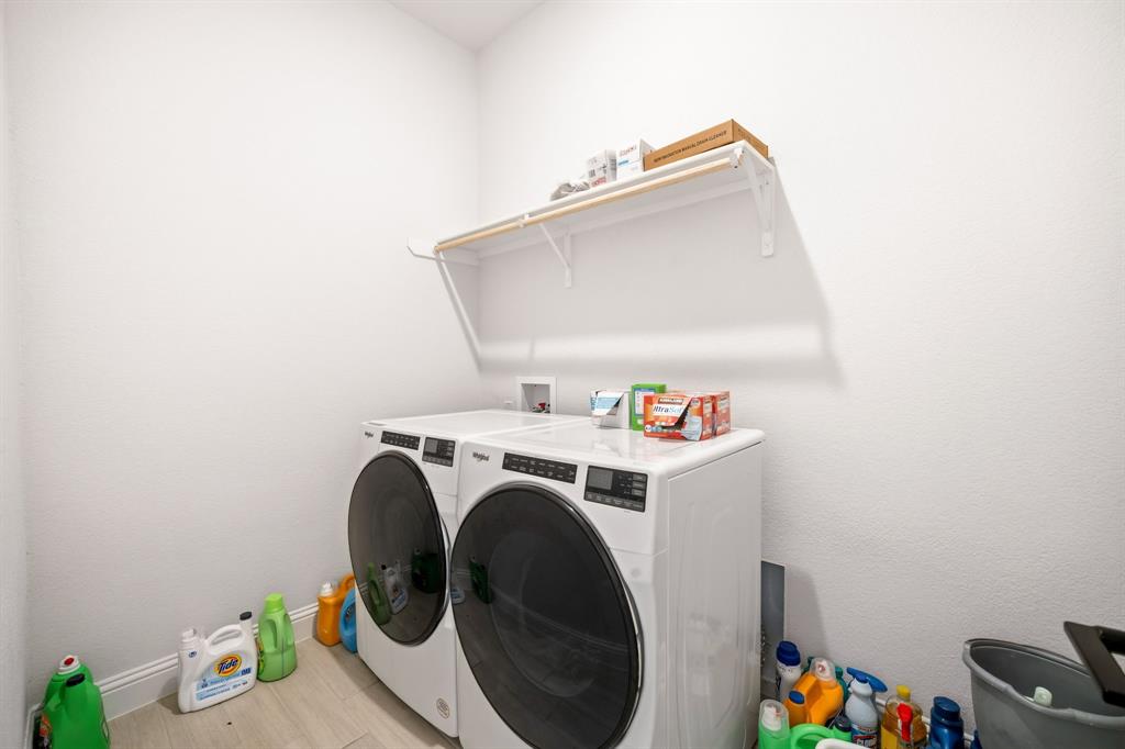 3841 Eagles Bluff Road Midlothian, TX 76065 - Photo 25 of 36 a utility room with dryer and washer