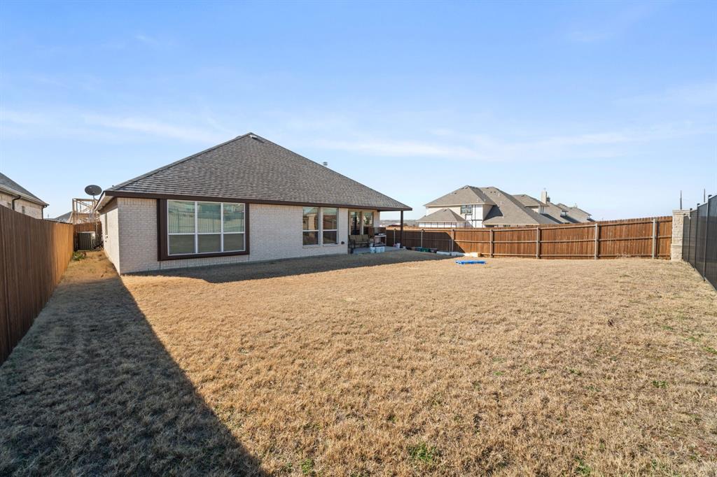 3841 Eagles Bluff Road Midlothian, TX 76065 - Photo 28 of 36 a house with trees in front of it