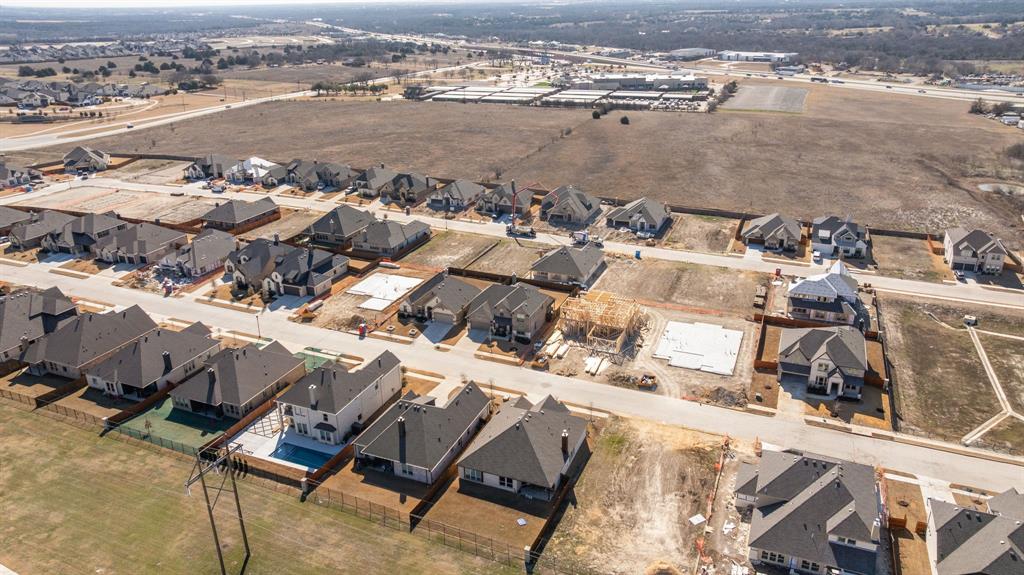 3841 Eagles Bluff Road Midlothian, TX 76065 - Photo 33 of 36 an aerial view of a city with ocean view