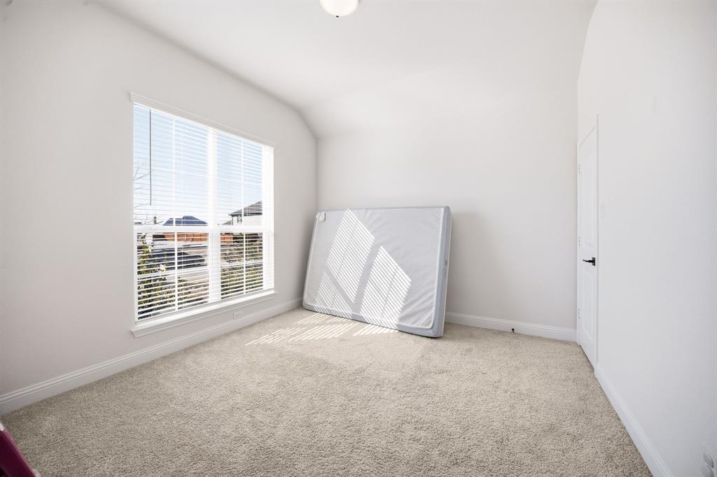 3841 Eagles Bluff Road Midlothian, TX 76065 - Photo 5 of 36 an empty room with windows