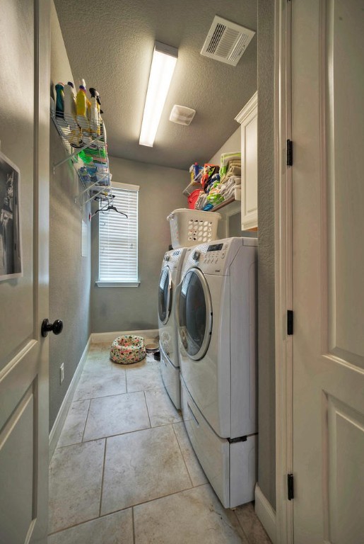 101 Maxwell Way Austin, TX 78738 - Photo 25 of 40 a view of a hallway with washer and dryer