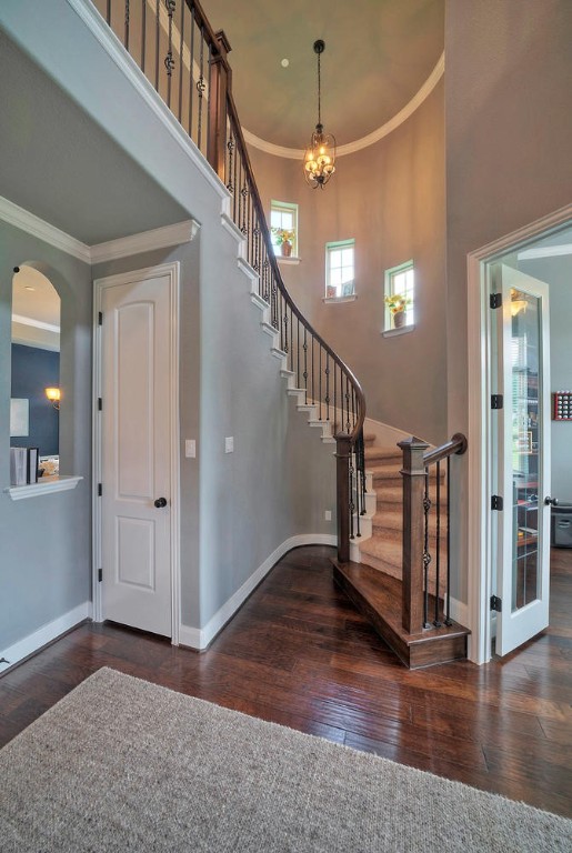 101 Maxwell Way Austin, TX 78738 - Photo 26 of 40 a view of an entryway with wooden floor and staircase