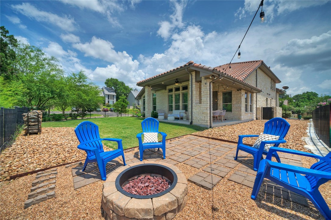 101 Maxwell Way Austin, TX 78738 - Photo 38 of 40 a view of a house with pool and chairs