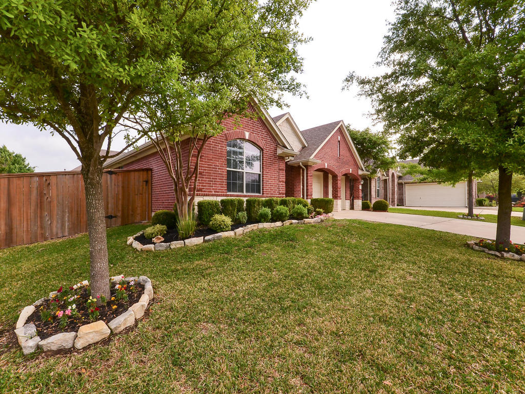 814 Fork Ridge Path Round Rock, TX 78665 - Photo 1 of 1 a front view of a house with a yard