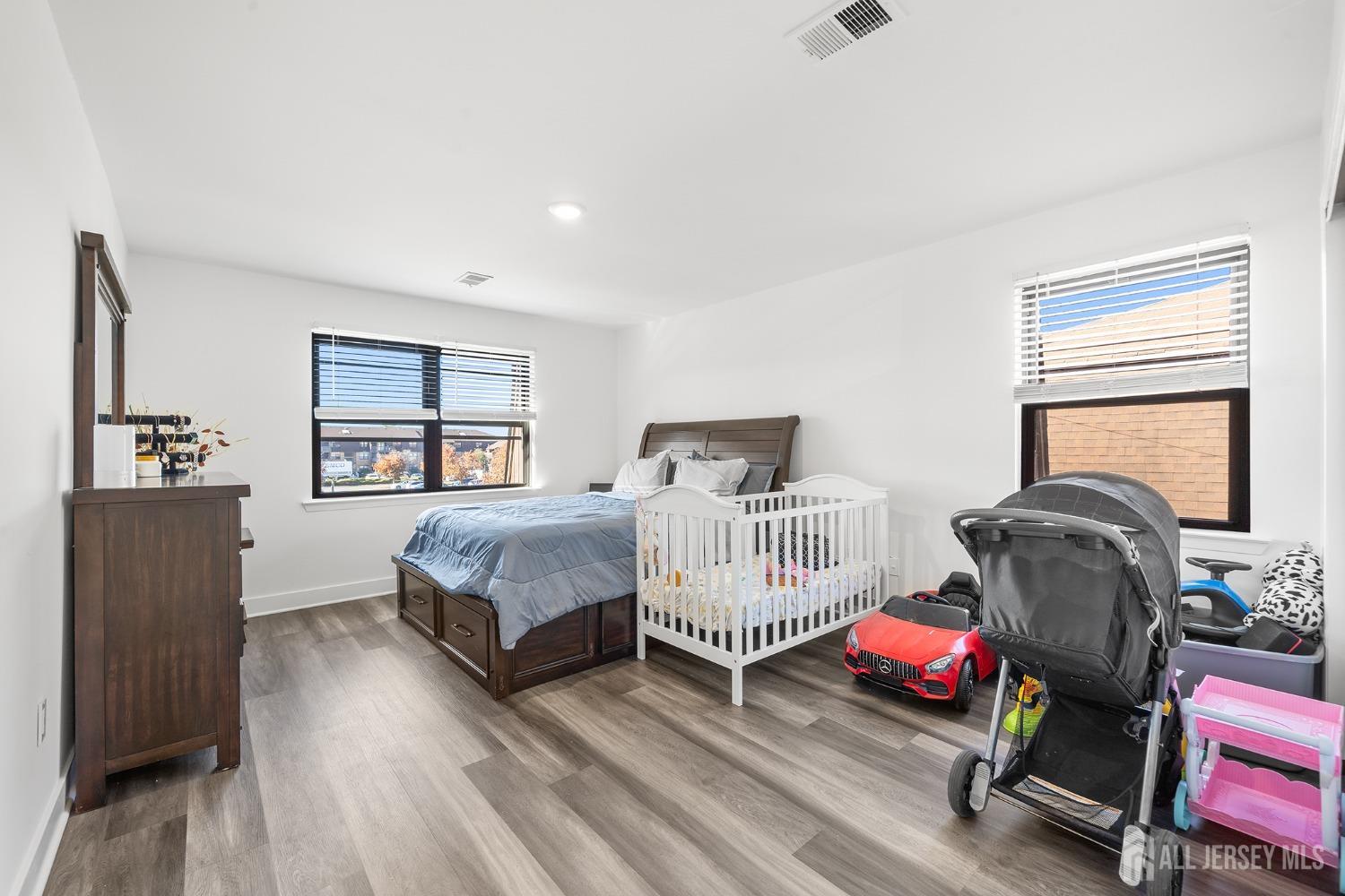 1609 Raspberry Court Edison, NJ 08817 - Photo 13 of 18 a bedroom with furniture and a window
