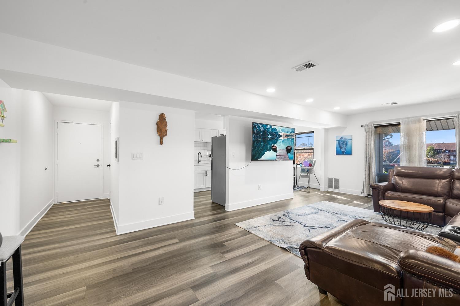 1609 Raspberry Court Edison, NJ 08817 - Photo 4 of 18 a living room with furniture and wooden floor
