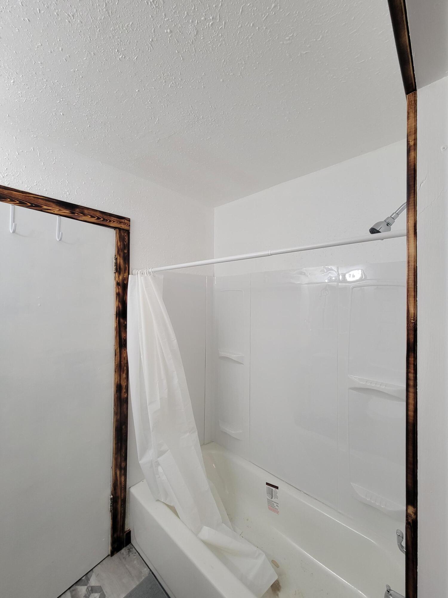 132 Pr 621 Haskell, TX 79521 - Photo 11 of 19 a bathroom with a shower