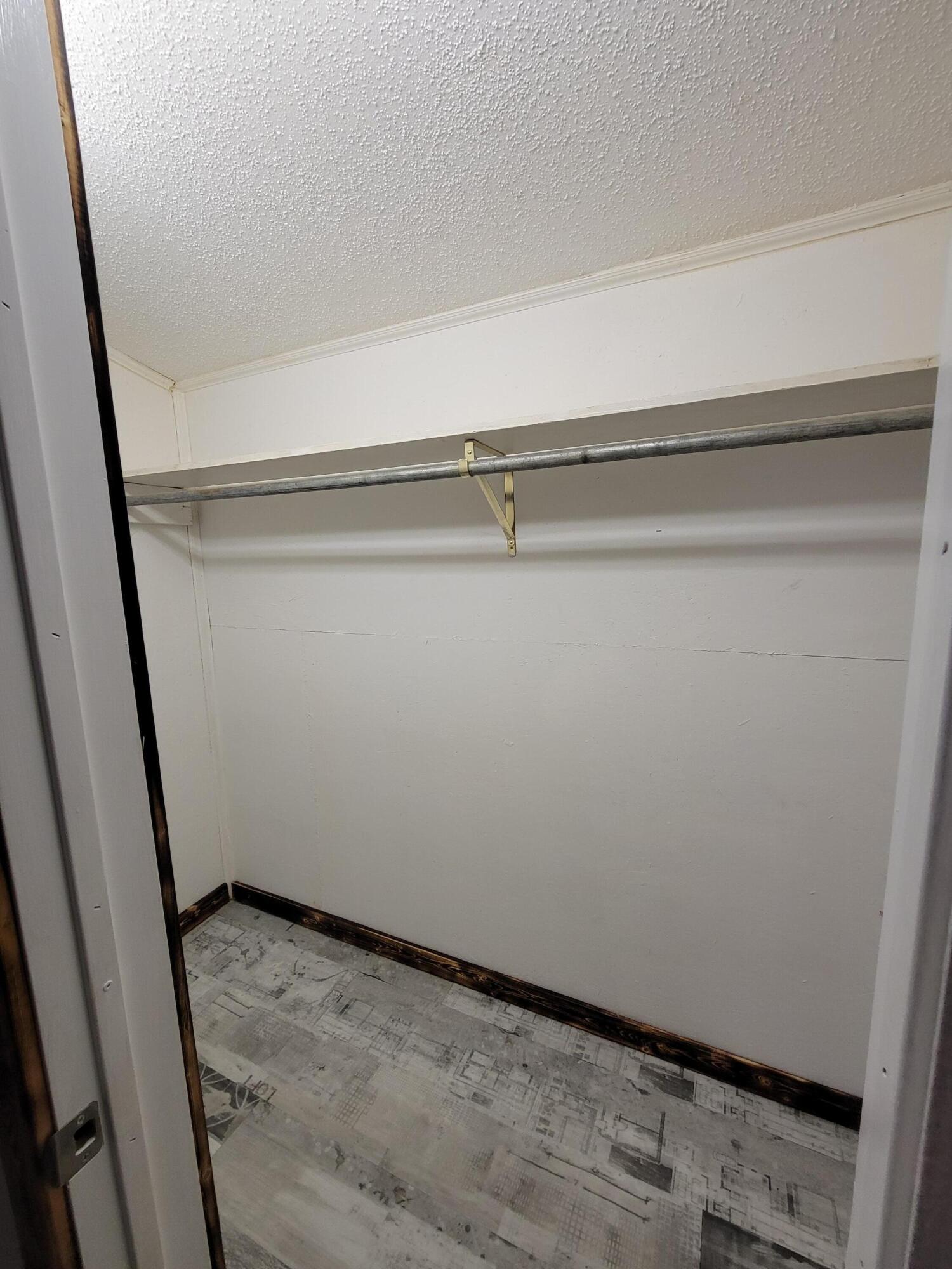 132 Pr 621 Haskell, TX 79521 - Photo 15 of 19 a view of a room with wooden floor