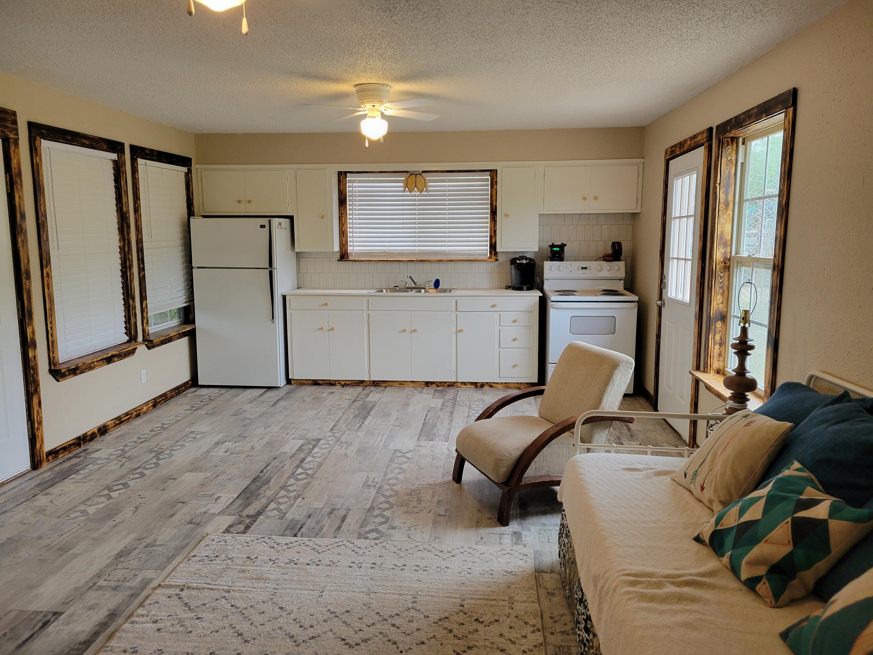 132 Pr 621 Haskell, TX 79521 - Photo 6 of 19 a living room with furniture and a flat screen tv