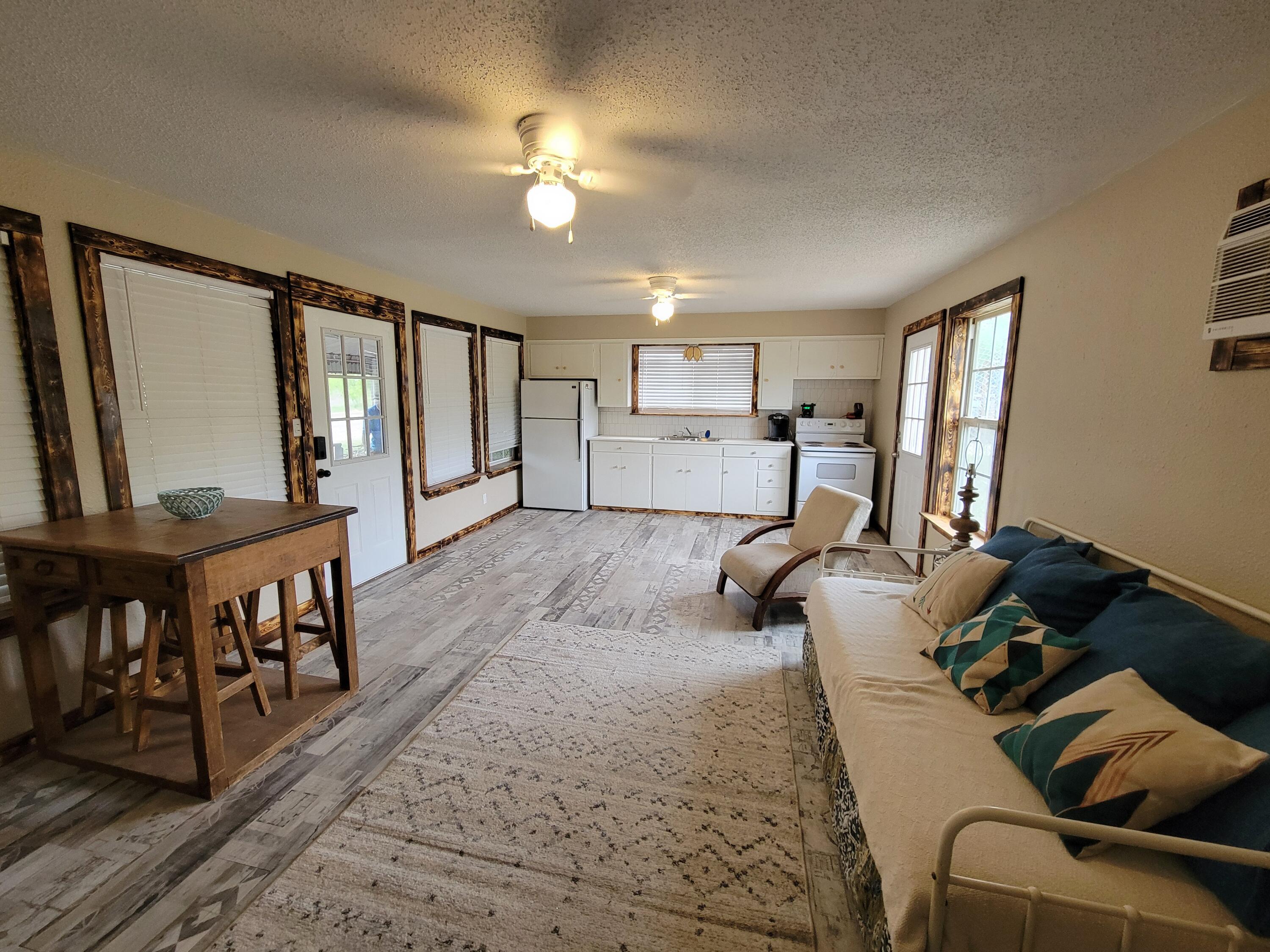 132 Pr 621 Haskell, TX 79521 - Photo 7 of 19 a bed room with furniture and a window