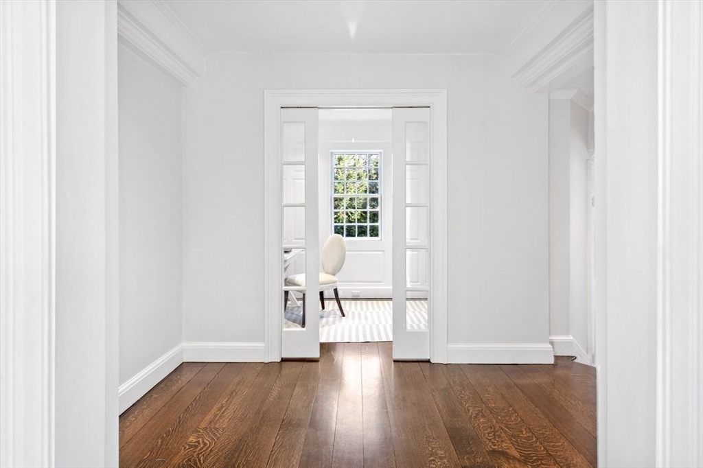 10 R Martins Lane Hingham, MA 02043 - Photo 24 of 40 a view of empty room with wooden floor and fan
