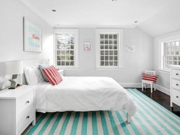 10 R Martins Lane Hingham, MA 02043 - Photo 28 of 40 a bedroom with a bed and a window