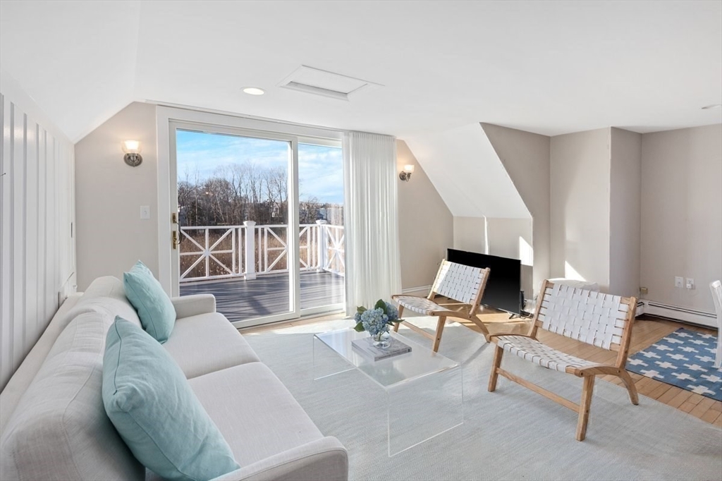 10 R Martins Lane Hingham, MA 02043 - Photo 37 of 40 a living room with furniture and a large window