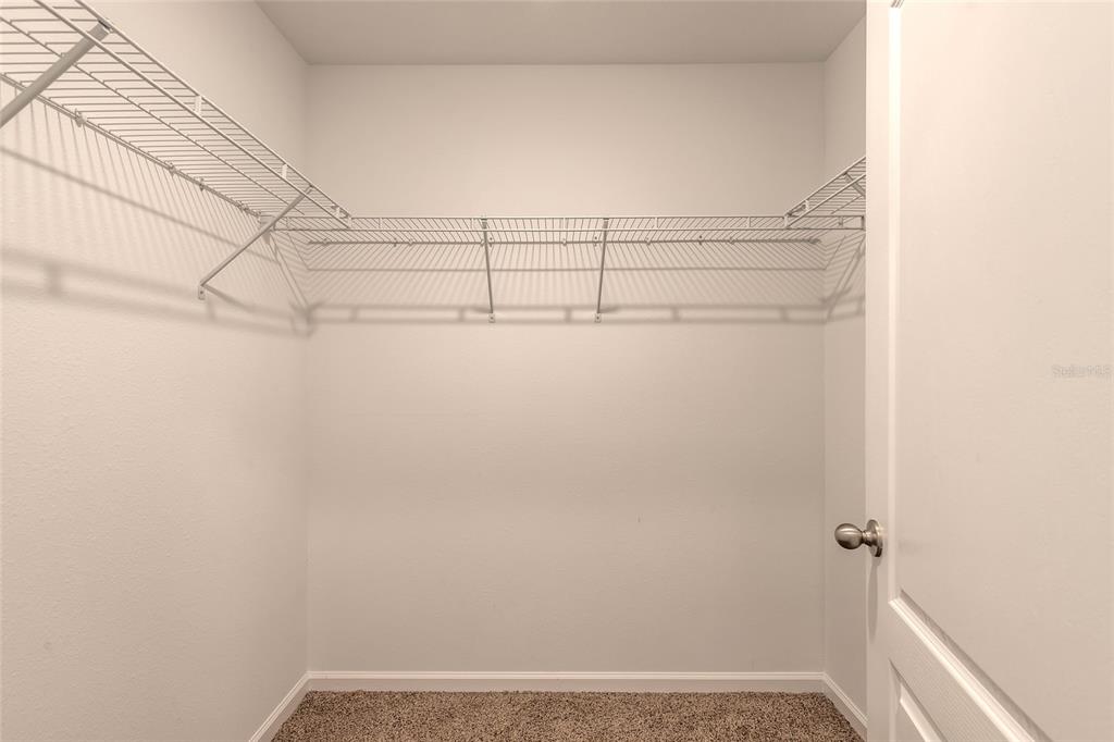82 Hulett Wds Road Palm Coast, FL 32137 - Photo 23 of 48 a view of a room with racks on the wall
