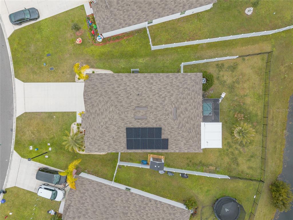 82 Hulett Wds Road Palm Coast, FL 32137 - Photo 48 of 48 an aerial view of a house with a swimming pool