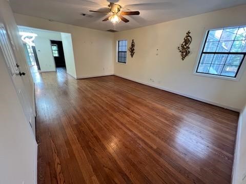 5110 Academy Street, Unit 4 Houston, TX 77005 - Photo 4 of 8 wooden floor in an empty room with a window